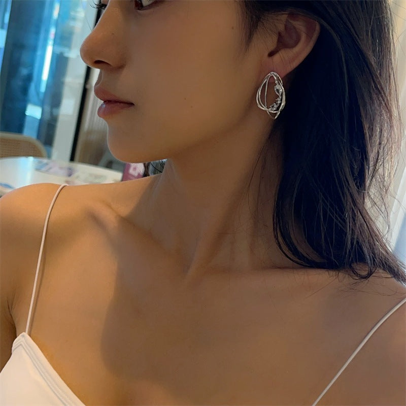 Boucles d'Oreilles en Or Entrelaçées