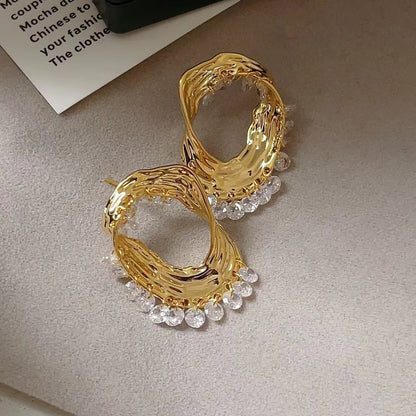 Boucles d'Oreilles en Or Entrelaçées