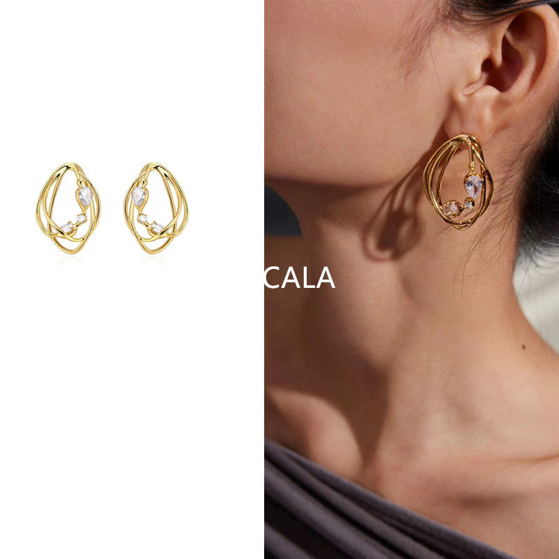 Boucles d'Oreilles en Or Entrelaçées